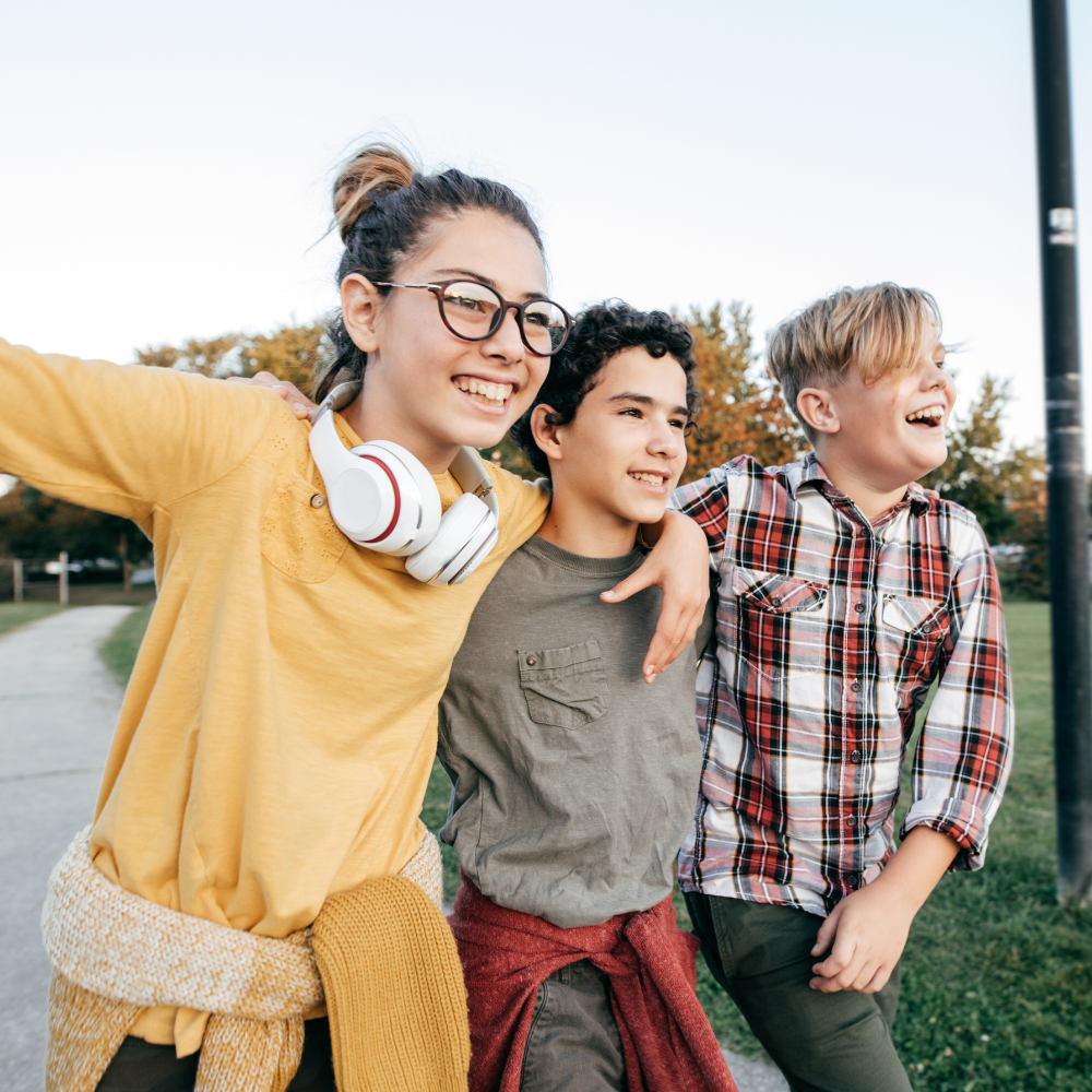 Happy teenagers who would take teen therapy